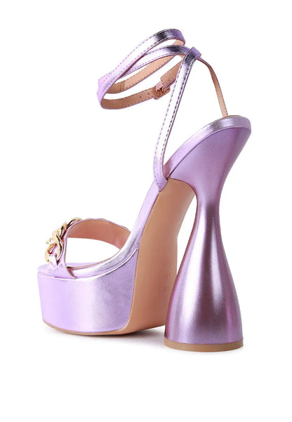 Stylish Big Bash Metallic High Platform Chunky Sandals in purple, featuring hourglass heel and chic chain embellishment.